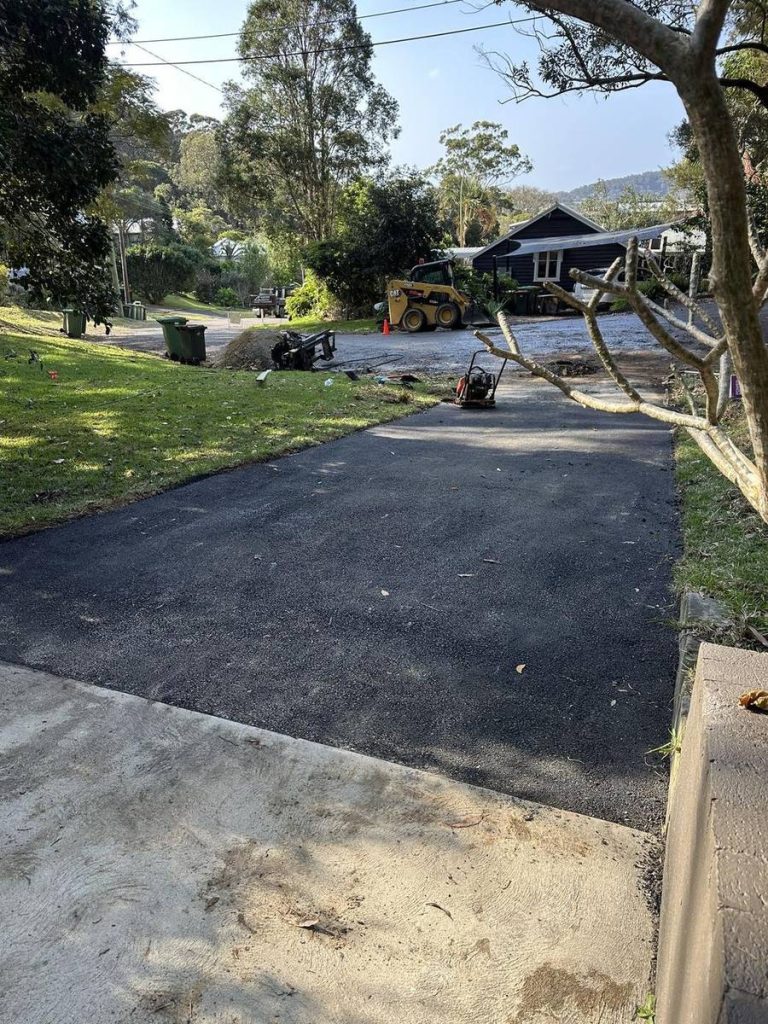 Finished asphalt driveway on a sloping Central Coast block
